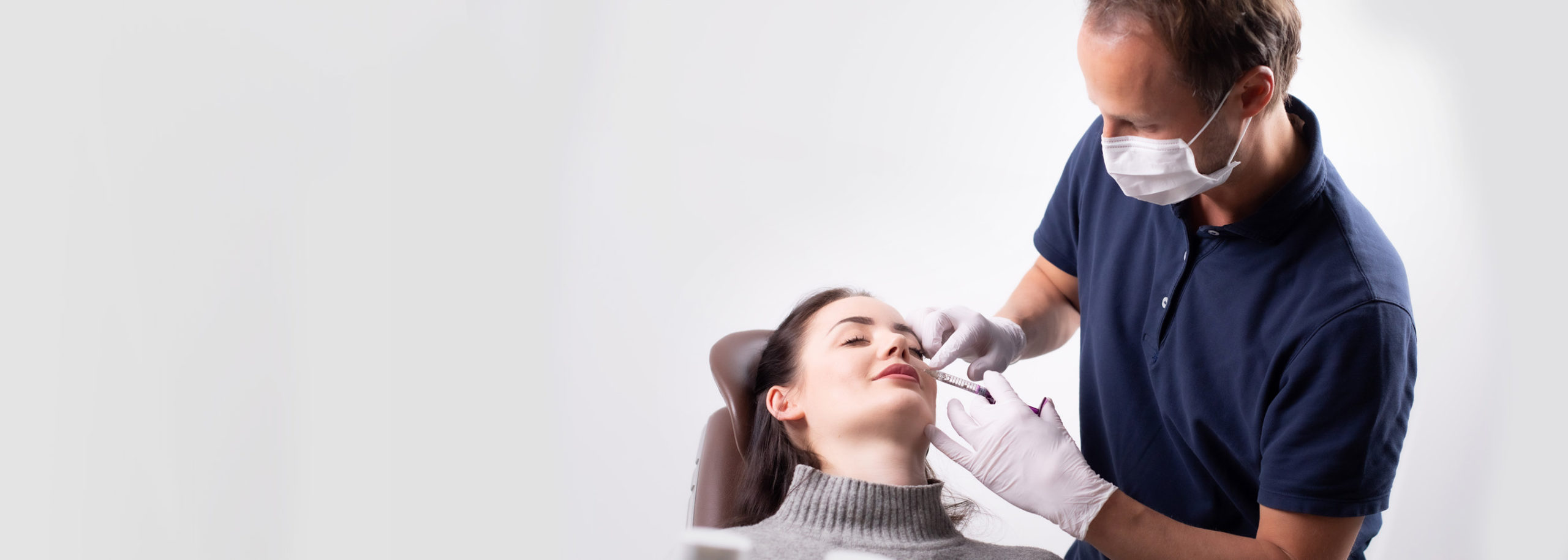 Dentist showing X-ray image to patient